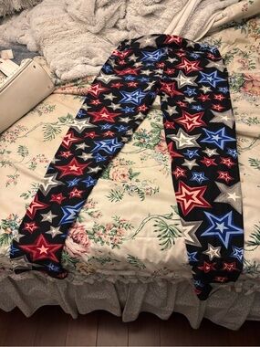 LuLaRoe Black Leggings with Red, Blue and Silver Stars